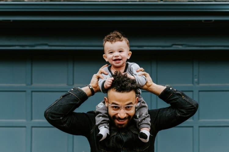 Father and child moment representing International Men's Day